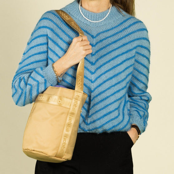 Putkimainen Olkalaukku - Hobbii
9