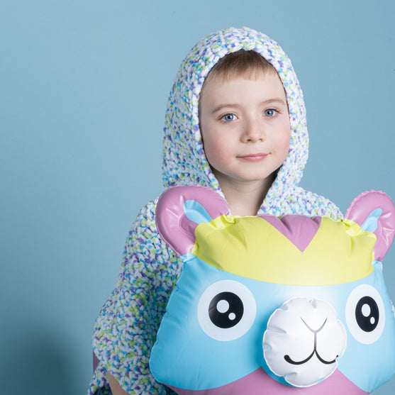 Ranta-poncho lapselle
8