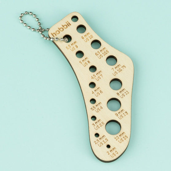 

Neulepuikkomittari Avainrenkaalla - Sukka - Hobbii
5