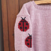 

Ladybug – Lasten neulepusero
3